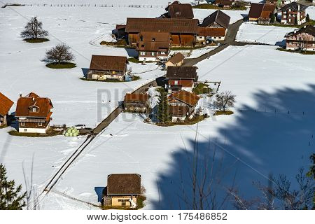 Aerial View Of A Little Village In Alps