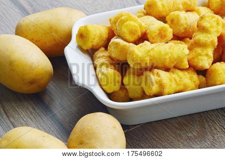 Frozen Cylindrical potato croquettes or German name is Kroketten