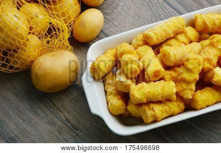 Frozen Cylindrical potato croquettes or German name is Kroketten