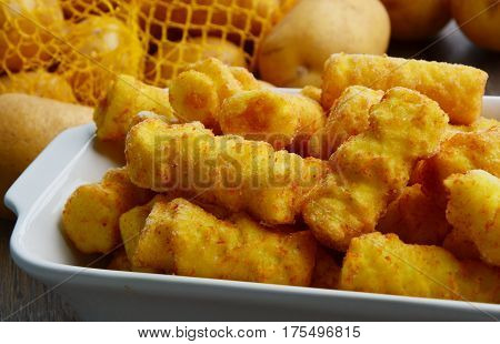 Frozen Cylindrical potato croquettes or German name is Kroketten