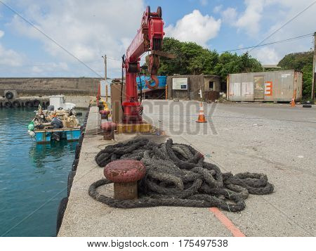 Shimen Taiwan - October 03 2016: Red crane in the fishing port in Shimen.