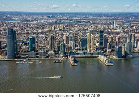 JERSEY CITY NEW JERSEY-MARCH 8 - A scenic view of the Newport section of Jersey City along the Hudson River waterfront as seen on March 8 2017 in New Jersey.