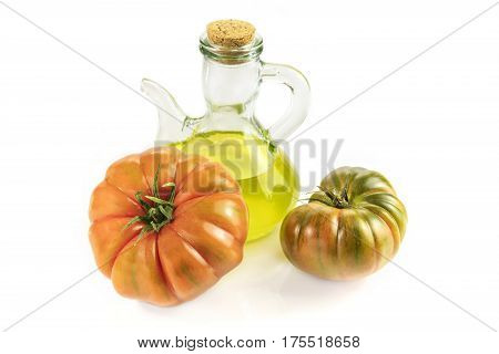 A photo of a shiny bottle of extra virgin olive oil with tomatoes Raf on white background