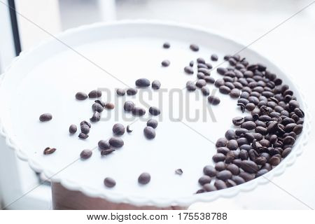 Coffee Beans On A White Plastic Plate. Beautifull Background. Love. Insparation. On White Plate.