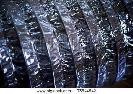 Abstract . Foil ventilation pipe. Industrial beauty of factory