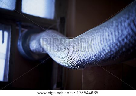 Abstract . Foil ventilation pipe. Industrial beauty of factory