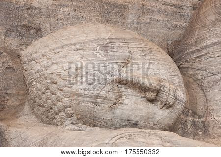 Statue of lying Buddha at Gal Vihara in Polonnaruwa or Pulattipura ancient city Kingdom of Polonnaruwa in Sri Lanka