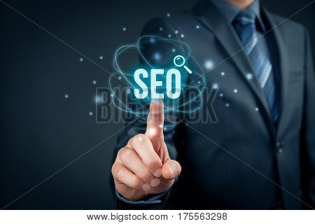Search engine optimization - SEO concept. Businessman or programmer is focused to improve SEO and web traffic.