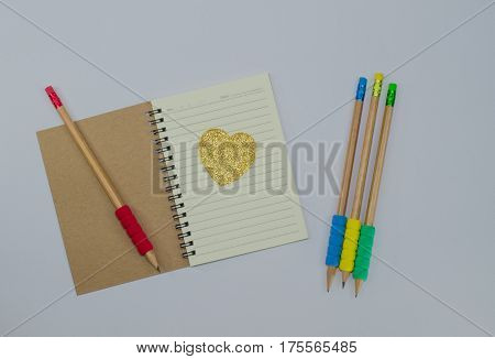 Recycled paper notebook open front cover on white background