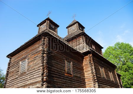 Ancient wooden church (XVIII century) from the Northern Ukraine in the open-air Museum of Folk Architecture near Kyiv.