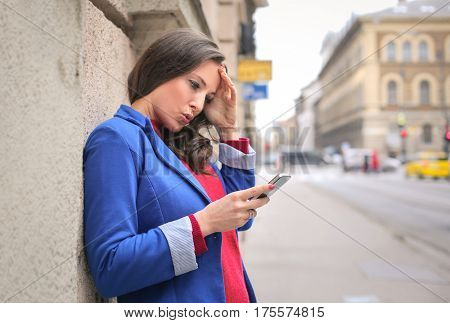 Young lady checking her phone
