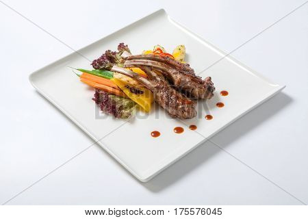 Pork Ribs Grilled With Roasted Vegetables And Boiled Potatoes