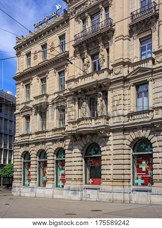 Zurich, Switzerland - 14 May, 2015: partial view of the facade of the Credit Suisse building on Paradeplatz square. Credit Suisse Group is a leading global financial services company headquartered in Zurich.