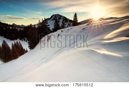 sunrise in snowy winter Alps Bavaria Germany