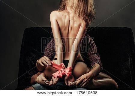Bare Female Body With Red Bow
