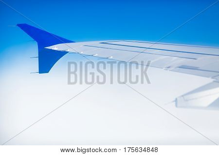 sky as seen through window of an aircraft