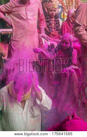 Vrindavan, India. March 19, 2016. Colourful Holi procession on the streets of Vrindavan, Uttar Pradesh, India.