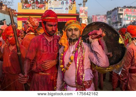 Nandgaon, India - March 18, 2016: Barsana villagers come to Nandgaon village to celebrate Lathmar Holi in Nandgaon, Uttar Pradesh, India.