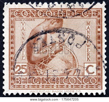BELGIAN CONGO - CIRCA 1923: a stamp printed in Belgian Congo shows Basketmaking craft circa 1923
