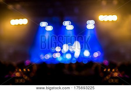 Blurred Background : Bokeh Lighting In Concert With Audience ,music Showbiz Concept