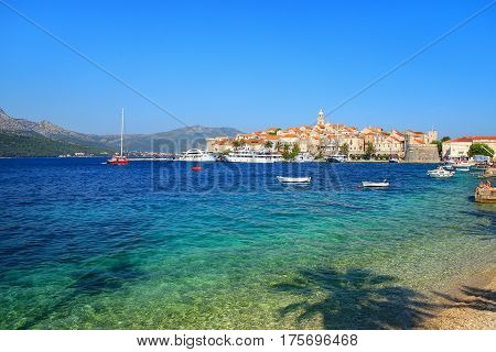 Clear water at the waterfront of Korcula town Croatia. Korcula is a historic fortified town on the protected east coast of the island of Korcula