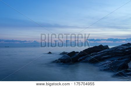 rock on the beach with sky at samila beach Thailand