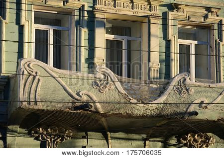 The part of facade of an old residential building on pedastrian street of Samara city