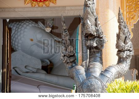 UDON THANI,THAILAND-JANUARY 25,2014 : The 20-meter long reclining Buddha, which is made from 43 blocks of exquisite Italian Carrara Marble, in Wat Pa Phu Kon of, Ban Na Kham, Ban Kong sub-district , Na yung District in Udon Thani Province, Thailand.