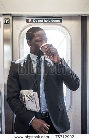 Businessman in full suit in New York subway metro