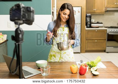 Food Blogger Whisking Some Eggs