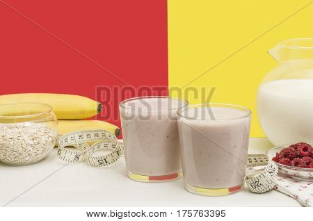Useful banana smoothie with oatmeal and raspberry berries. Bright and healthy breakfast