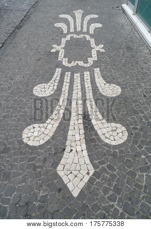 Typical Portuguese black and white stone mosaic 