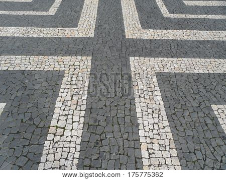 Typical Portuguese black and white stone mosaic 