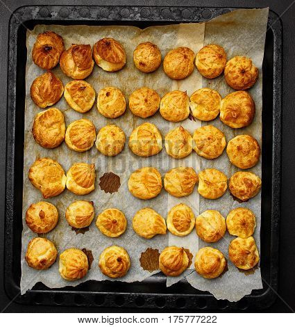 Baked Profiteroles On Tray Ready For Croquembouche. Top View