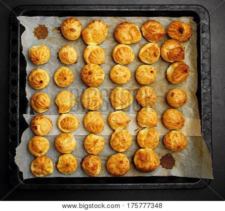 Baked Profiteroles On Tray Ready For Croquembouche. Top View