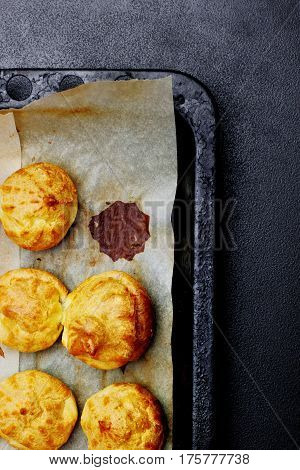 Baked Profiteroles On Tray Ready For Croquembouche. Top View. Copy Space