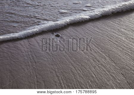 sand stones on sea waves sharp imagination