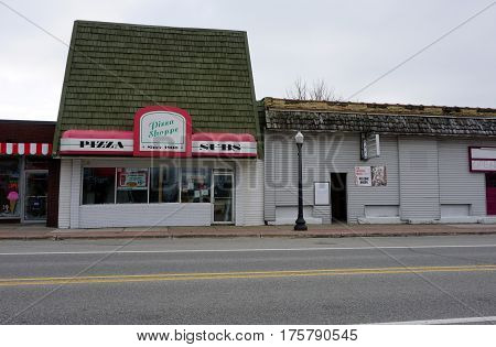 MANCELONA, MICHIGAN / UNITED STATES - NOVEMBER 27, 2016: One may eat pizza and sandwiches at the Pizza Shoppe, on State Street in downtown Mancelona.