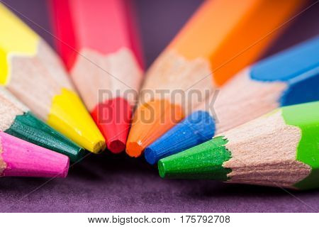 a closeup of colored pencils or crayons