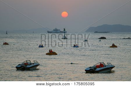 Fujian Province, China - Oct 23, 2009: Sunset In The Bay Of Gulangyu Island