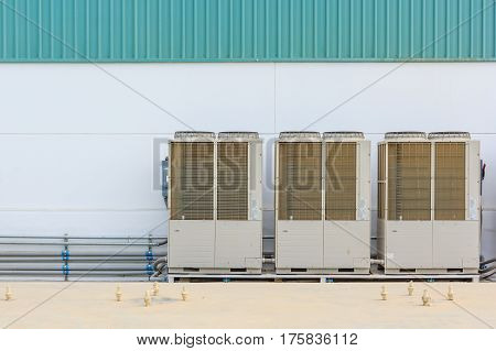 Air conditioning system assembled on side of a building - cooling and heating residential system