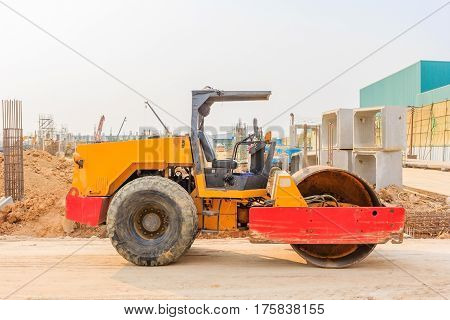 soil vibration roller during sand compacting works at construction site