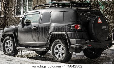 Kazakhstan, Ust-Kamenogorsk, 5 march, 2017: Toyota FJ Cruiser, back view, black car