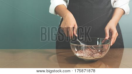 Woman chief preparing for bakery. Copy space.