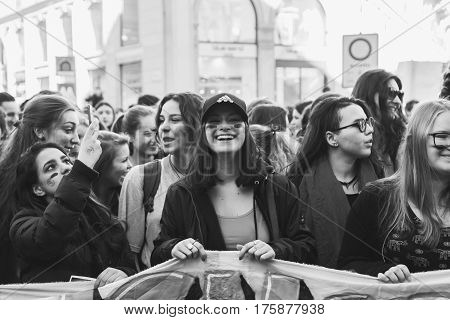 MILAN ITALY - MARCH 8: Secondary school students take part in a march to celebrate the International Women's Day on MARCH 8 2017 in Milan.