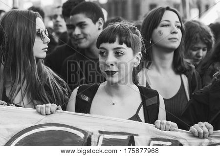 MILAN ITALY - MARCH 8: Secondary school students take part in a march to celebrate the International Women's Day on MARCH 8 2017 in Milan.