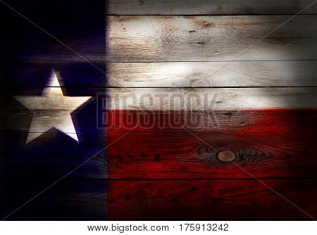 Flag of Texas USA painted on grungy wood plank background