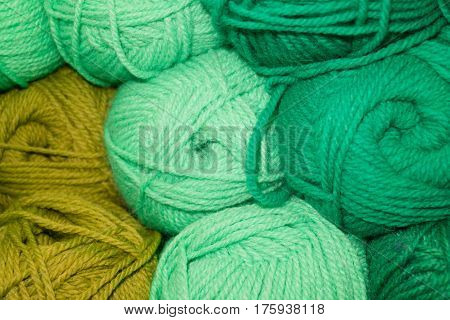 Many woolen yarn green light green and mustard color rich texture