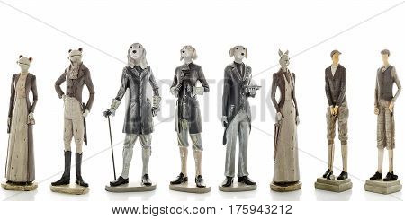 Decorative figurines, statuette of dog and frog and man, accessories interior on a white background