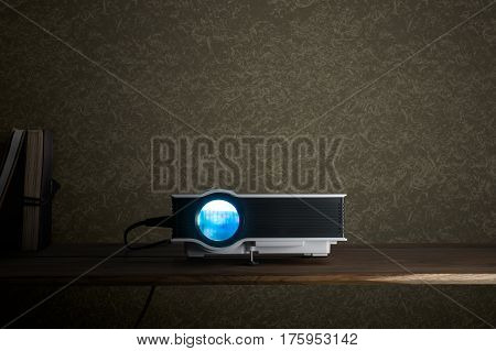 Mini Led Projector On Wood Table In A Room Projector Home Theater Concept.